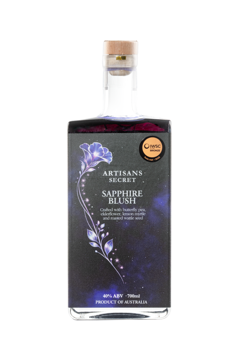 700ml Sapphire Blush Gin. The bottle’s label showcases a butterfly pea flower on a vibrant blue-purple backdrop.